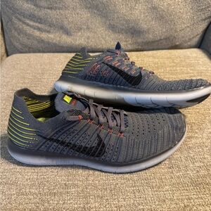 Nike Free RN Flyknit Dark Gray and Black Sneakers with Red/yellow Highlights